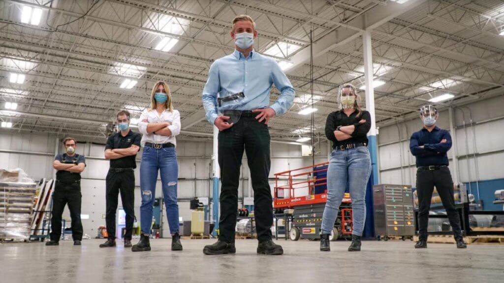 A photo of InkSmith and Canadian Shield Co-Founder and CEO Jeremy Hedges and some of his team in their new Kitchener facility.